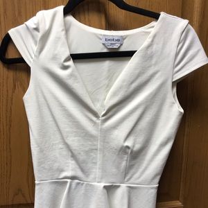 BEBE cream size medium v neck top